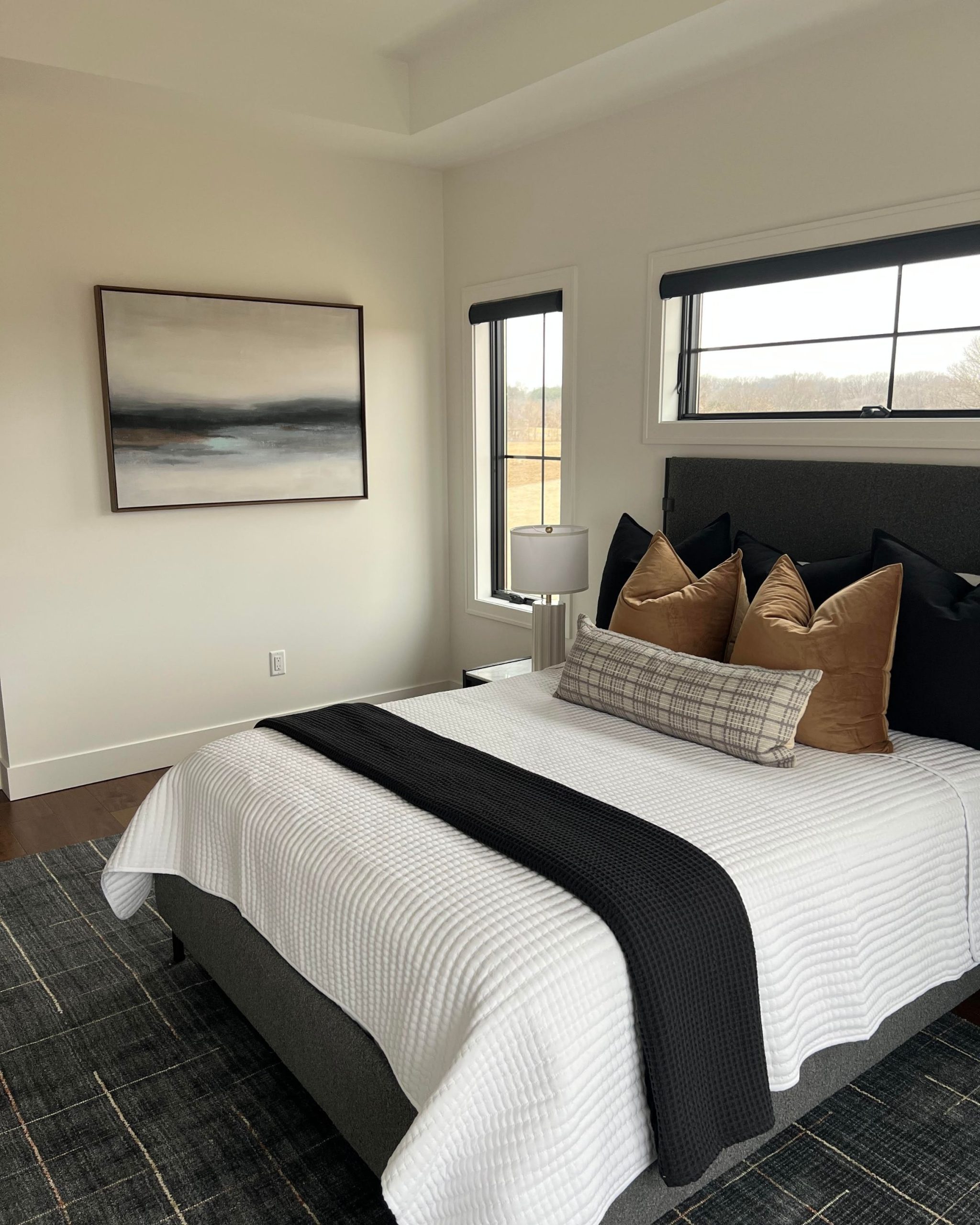 Bedroom layout example showing proper area rug size placement under a bed