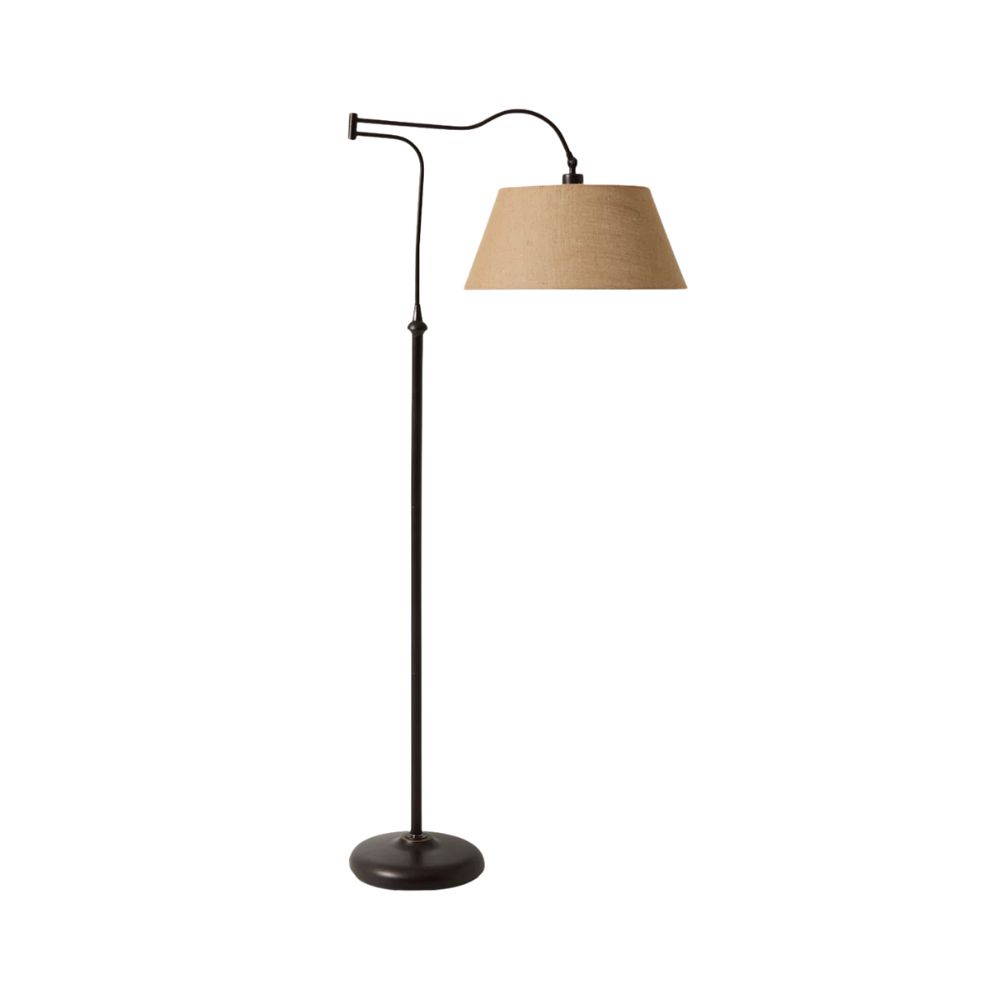 Classic floor lamp with a linen shade and dark metal base inspired by historic coastal interiors.