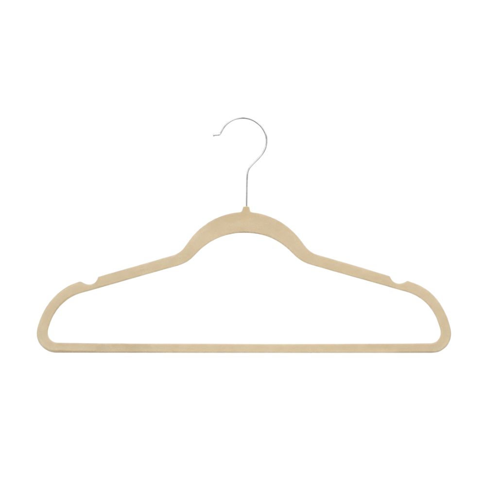 Neutral velvet hangers for providing closet space to overnight guests
