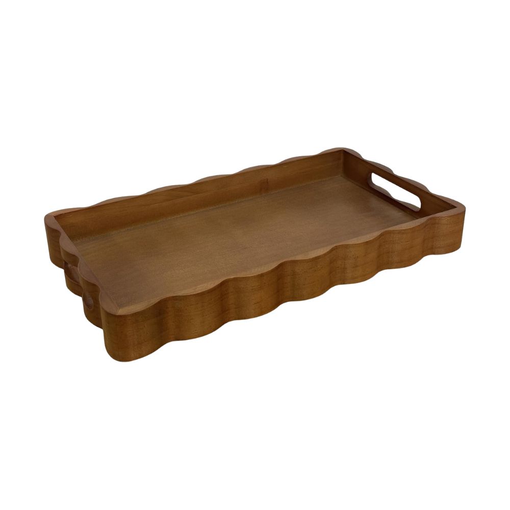 Brown scalloped wooden tray for displaying guest room essentials