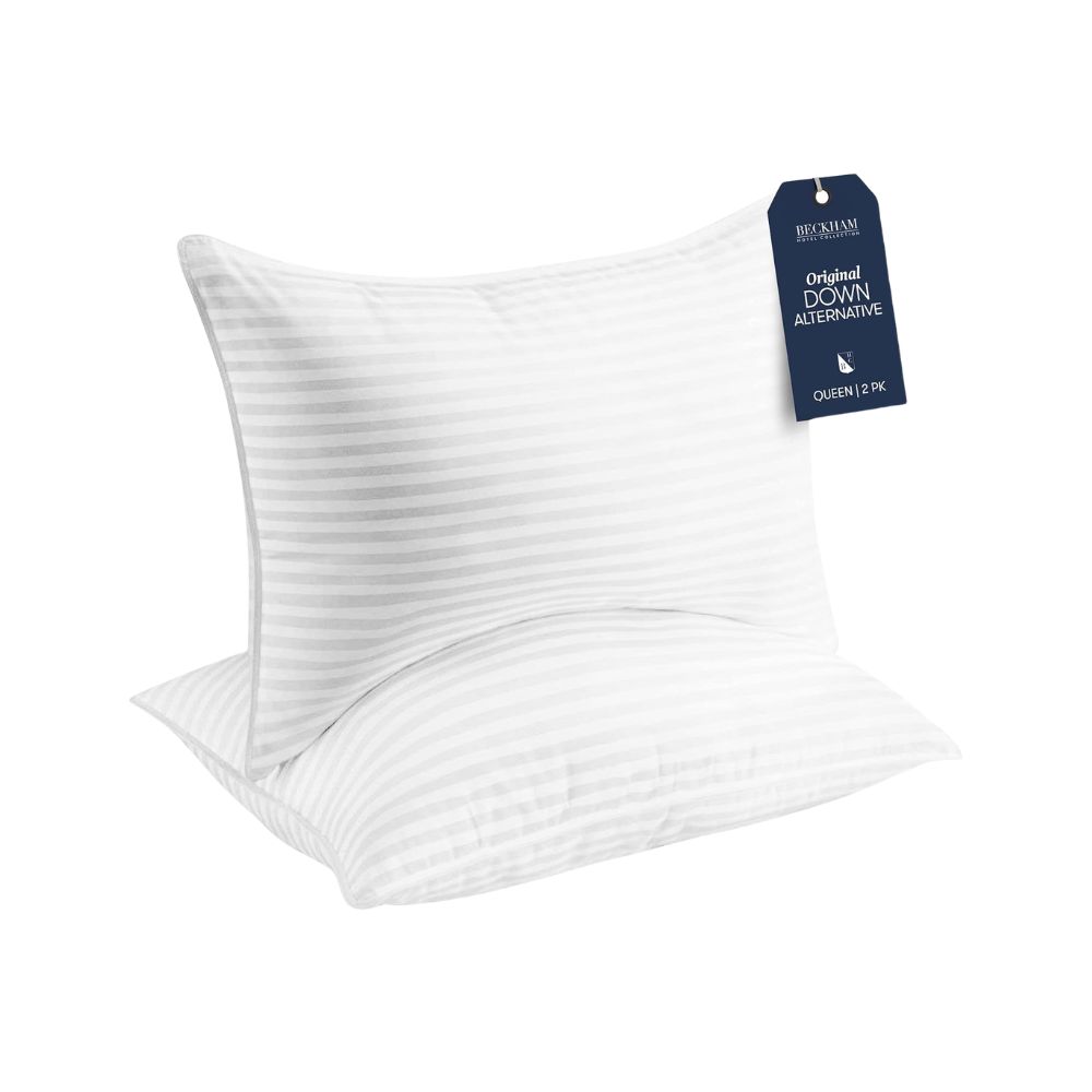 White bed pillows for creating a comfortable and welcoming guest bed